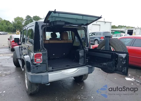 2012 Jeep Wrangler Unlimited Sahara z USA, uszkodzony, nr VIN 1C4BJWEGXCL133091